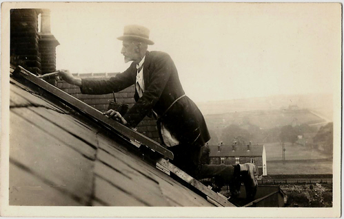 Joshua Biltcliffe mending his skylight at 8 Bridge Street, Penistone